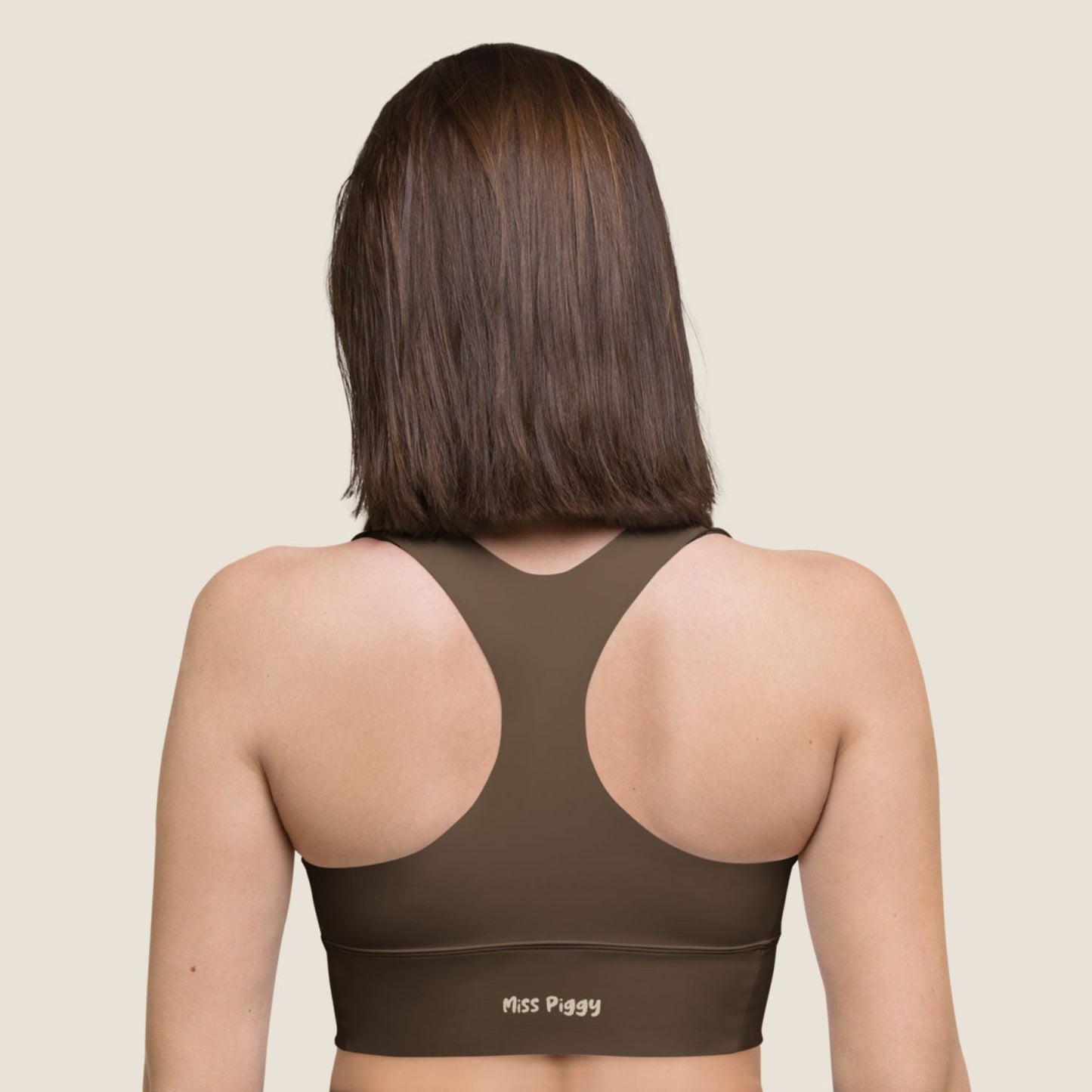 Top UNSEEN MOVE in espresso brown with sand print, sustainable activewear by Miss Piggy.