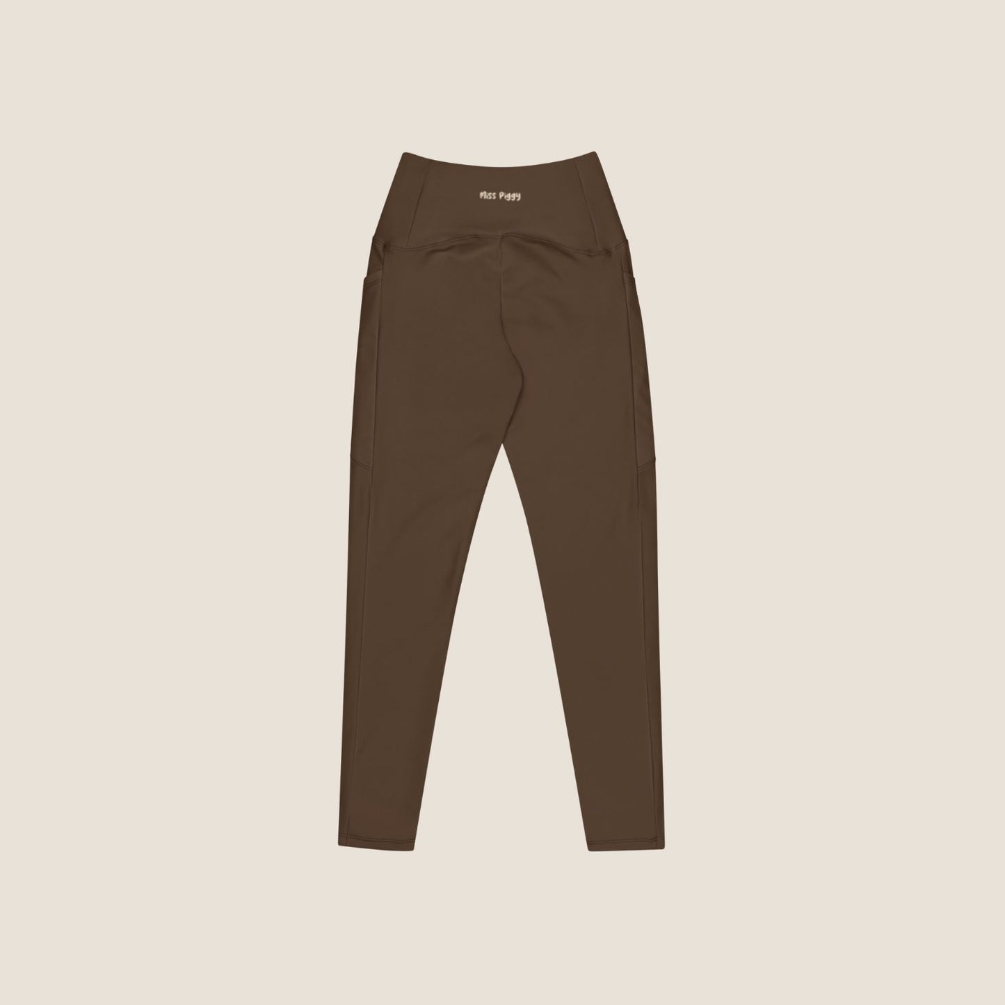 High-rise UNSEEN MOVE Leggings in espresso brown, eco-conscious design for everyday movement.