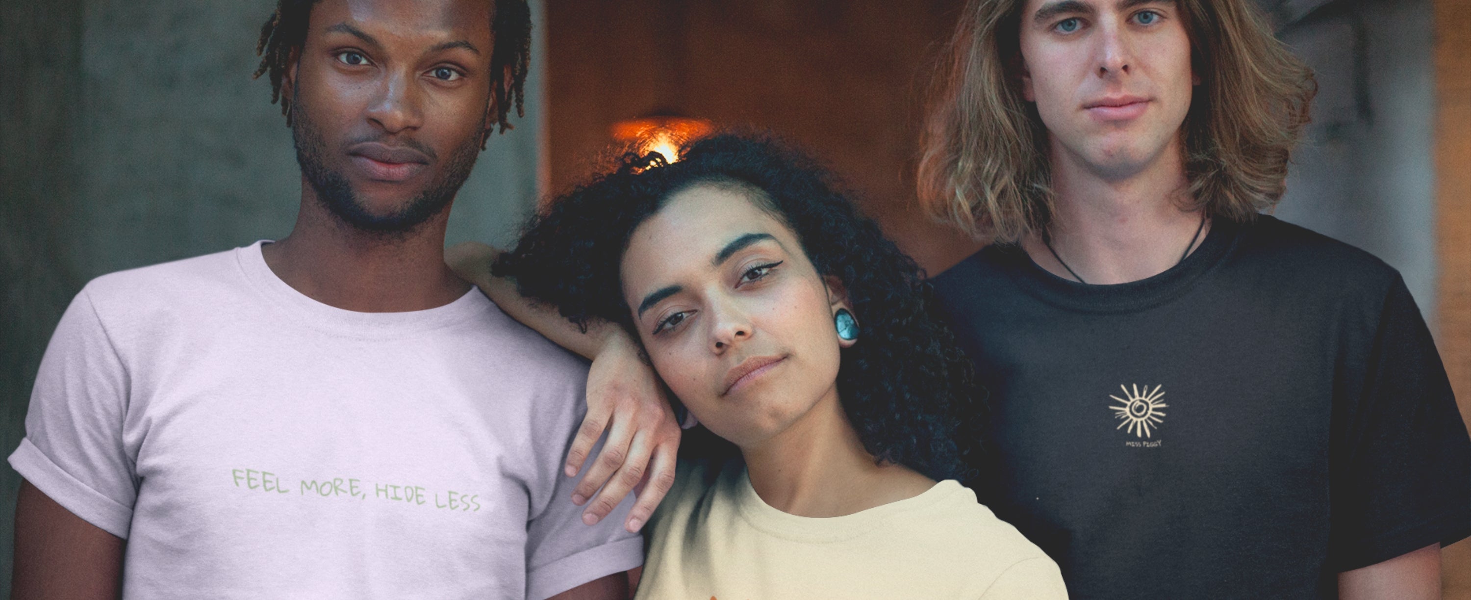 Three models wearing Miss Piggy organic and recycled t-shirts, standing together and representing the Soulwear community of presence, softness, and intention.