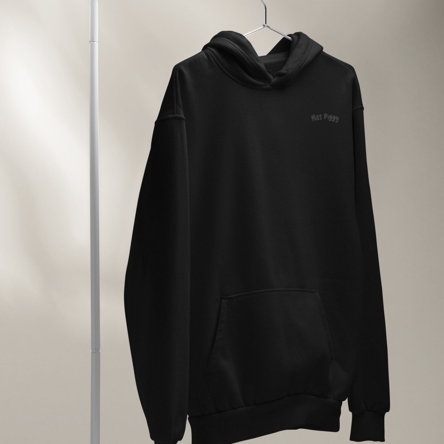CALM Organic Hoodie in black with charcoal print, minimal sustainable fashion by Miss Piggy.