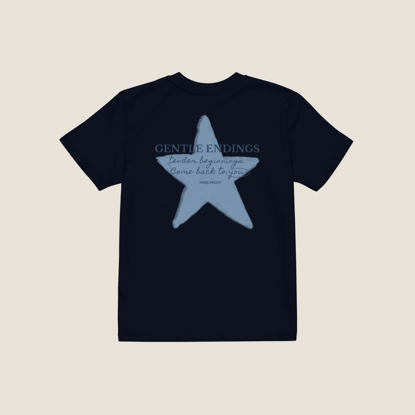 Organic kids t-shirt in navy with Gentle Endings front print and back featuring star illustration and Gentle Endings message.
