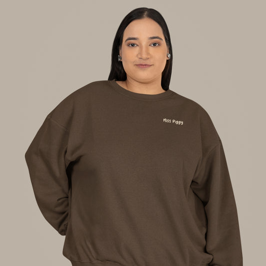 Unisex UNSEEN Recycled Sweater in espresso brown with sand print, minimalist sustainable design by Miss Piggy.