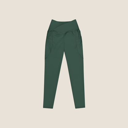 DEEP MOVE Leggings in forest green with off-white print, made from recycled materials.