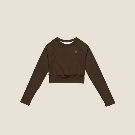Long sleeve UNSEEN MOVE Layer in espresso brown with sand print, sustainable activewear by Miss Piggy.