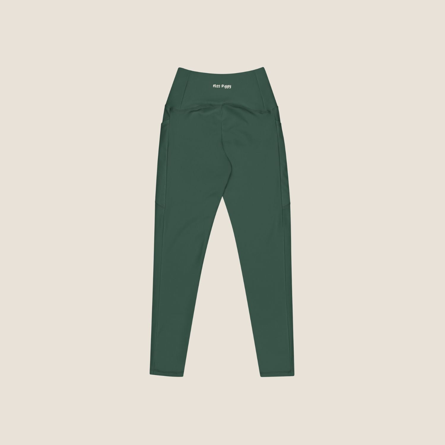 DEEP MOVE Leggings in forest green with off-white print, made from recycled materials.