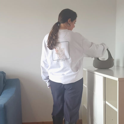 Unisex CONSISTENCY Organic Sweater in white with green print, minimalist sustainable design by Miss Piggy.