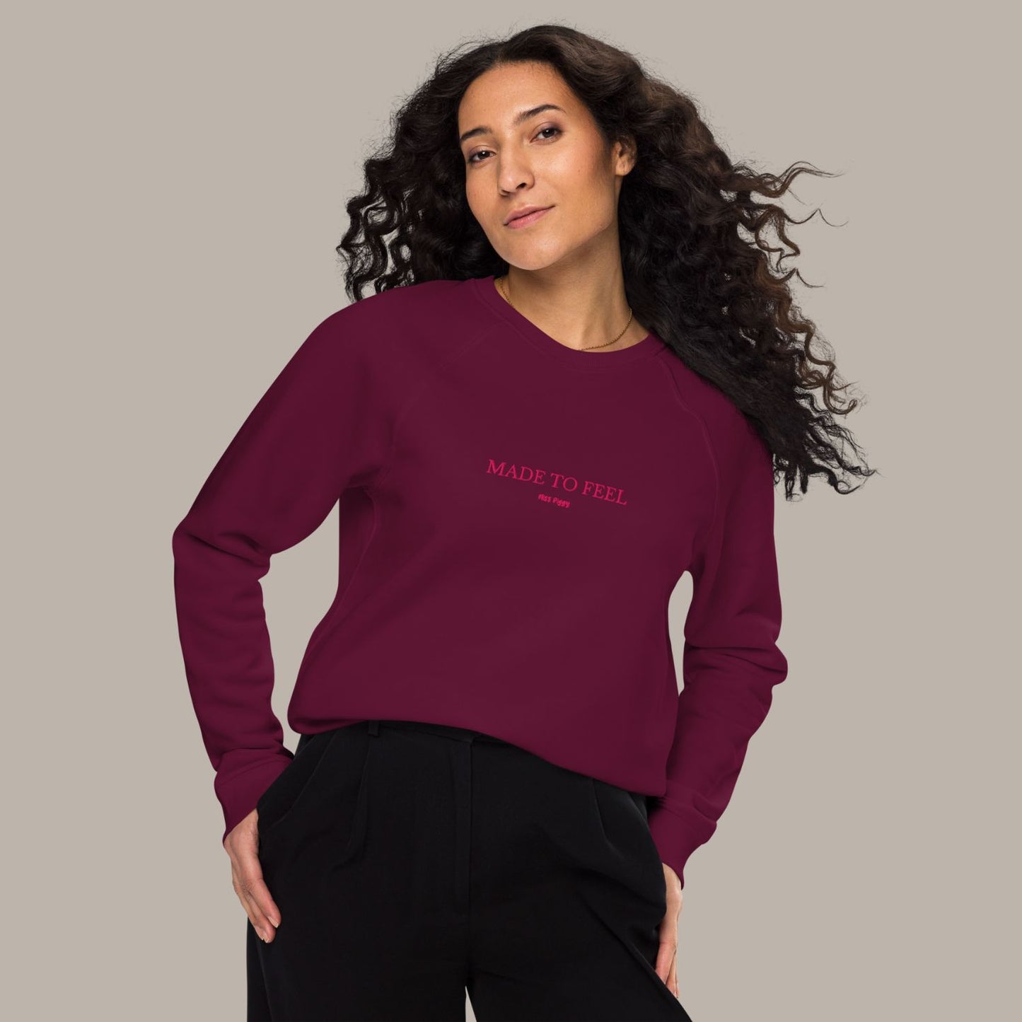 Unisex FEEL Blend Sweater in burgundy with lipstick pink embroidery, minimalist sustainable design by Miss Piggy.