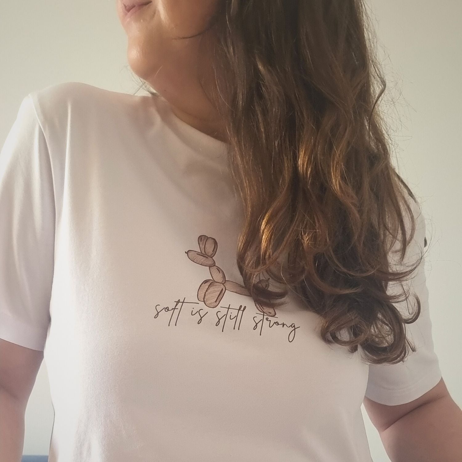 Unisex SOFT Organic T-shirt in white with brown print, minimalist sustainable design by Miss Piggy.