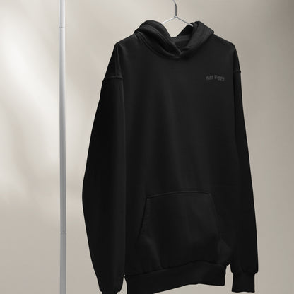 CALM Organic Hoodie in black with charcoal print, minimal sustainable fashion by Miss Piggy.