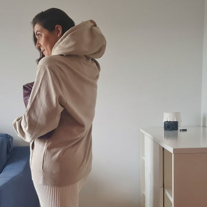 CALM Organic Hoodie in desert beige with camel print, sustainable comfort made from organic cotton.