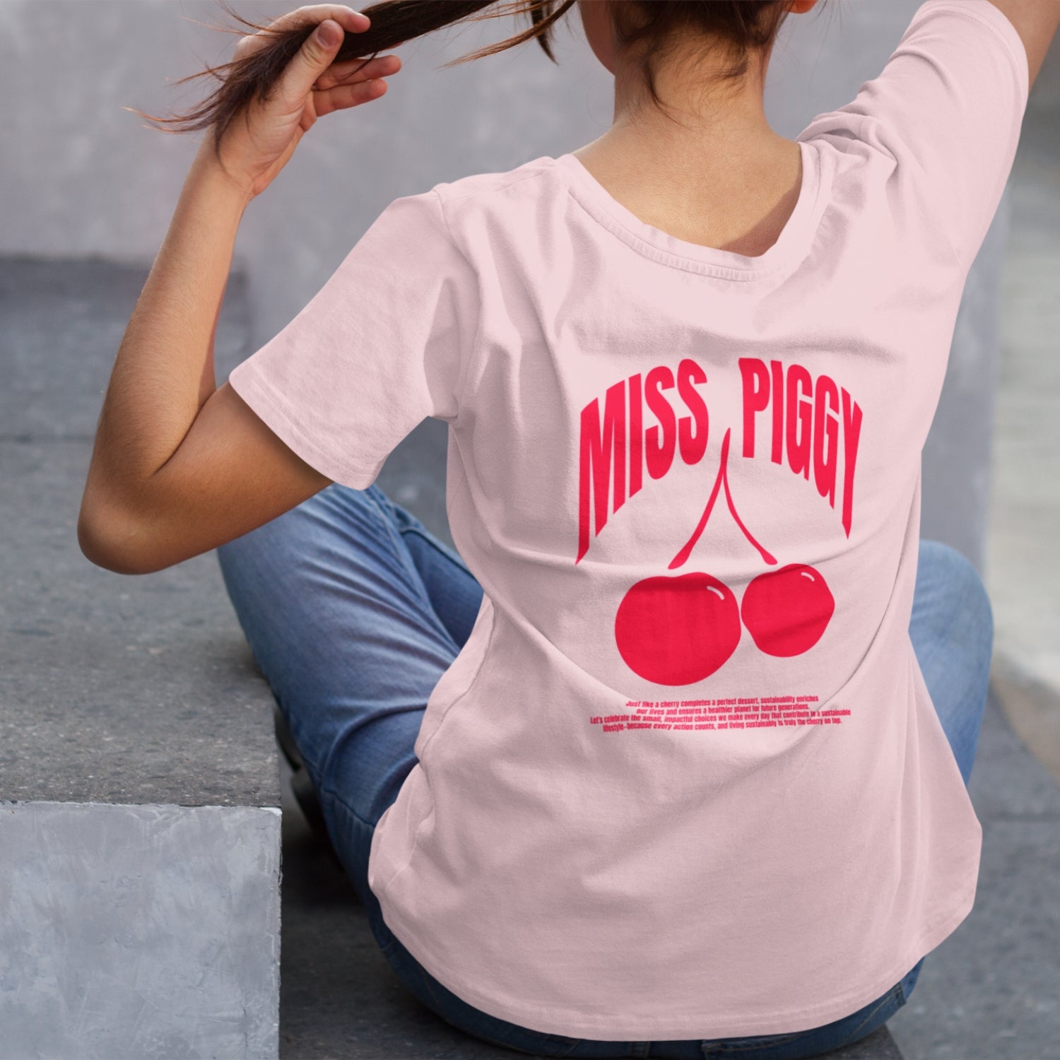 Cherry Organic Tee in pink with cherry red chest print, unisex fit, 100% organic cotton.