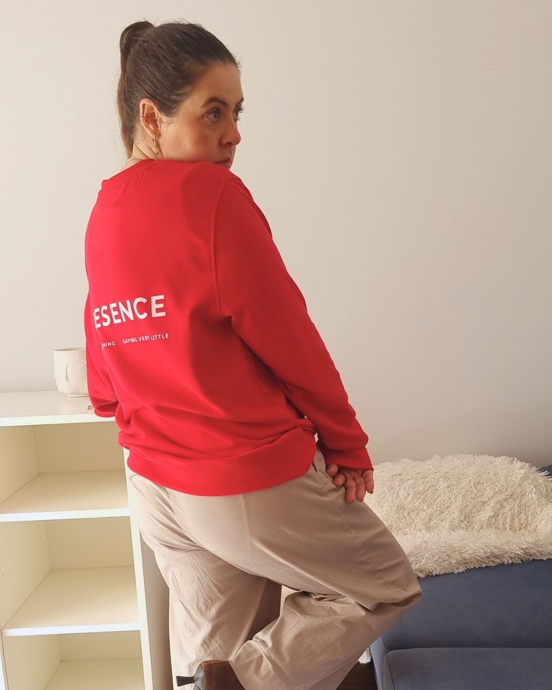 Unisex COME BACK TO YOU Blend Sweater in red with off-white print, minimalist sustainable design by Miss Piggy.