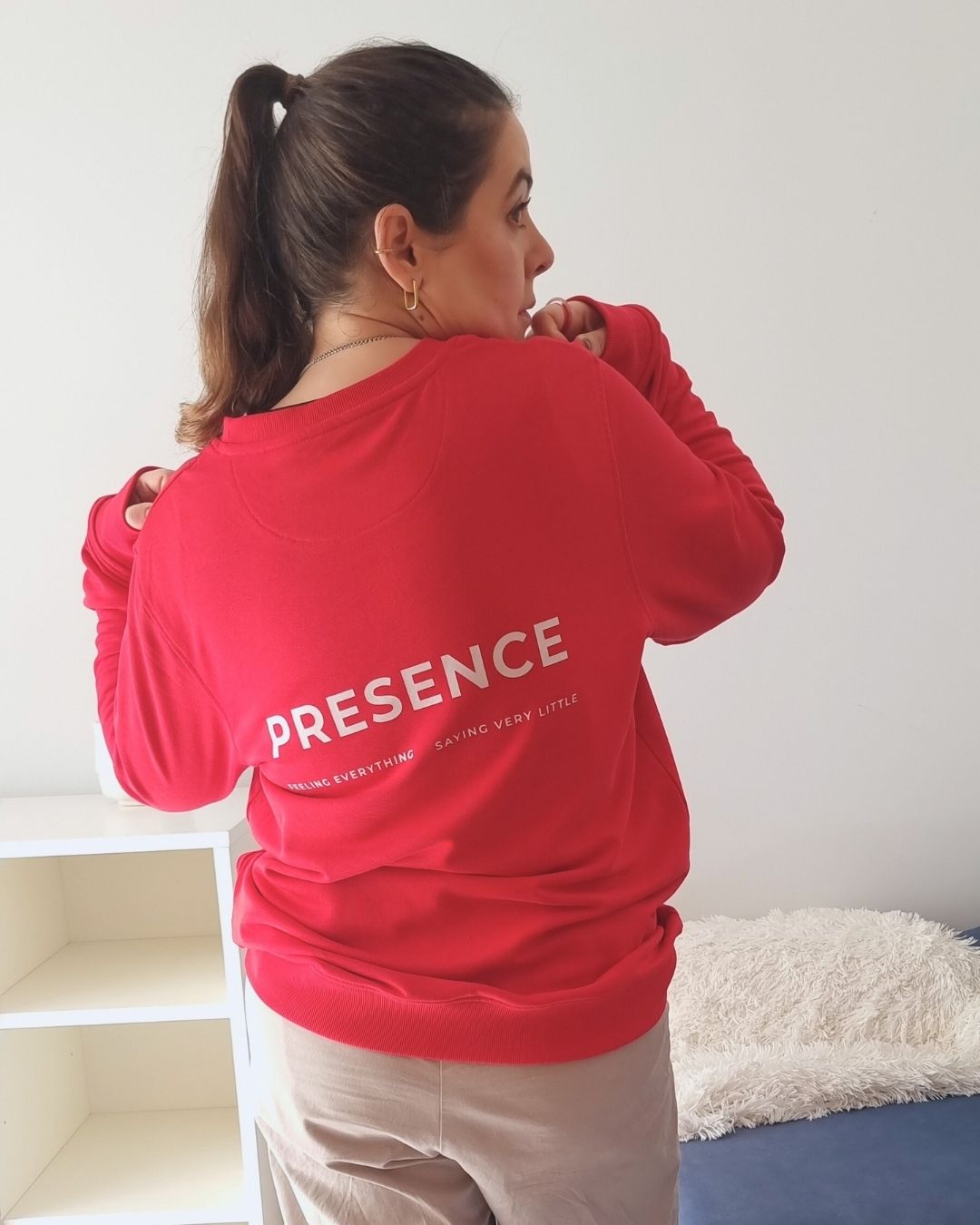 Unisex COME BACK TO YOU Blend Sweater in red with off-white print, minimalist sustainable design by Miss Piggy.