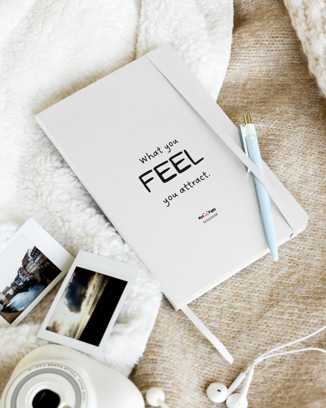 A durable Notebook UltraHyde hardcover, 80 lined cream pages, a matching elastic closure, and a ribbon bookmark with motivational quote.