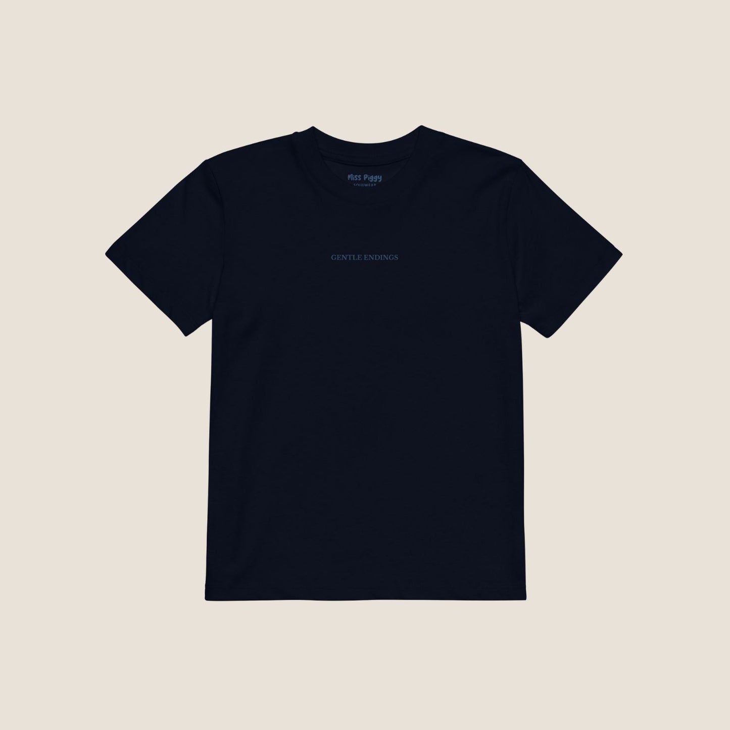 Organic kids t-shirt in navy with Gentle Endings front print and back featuring star illustration and Gentle Endings message.