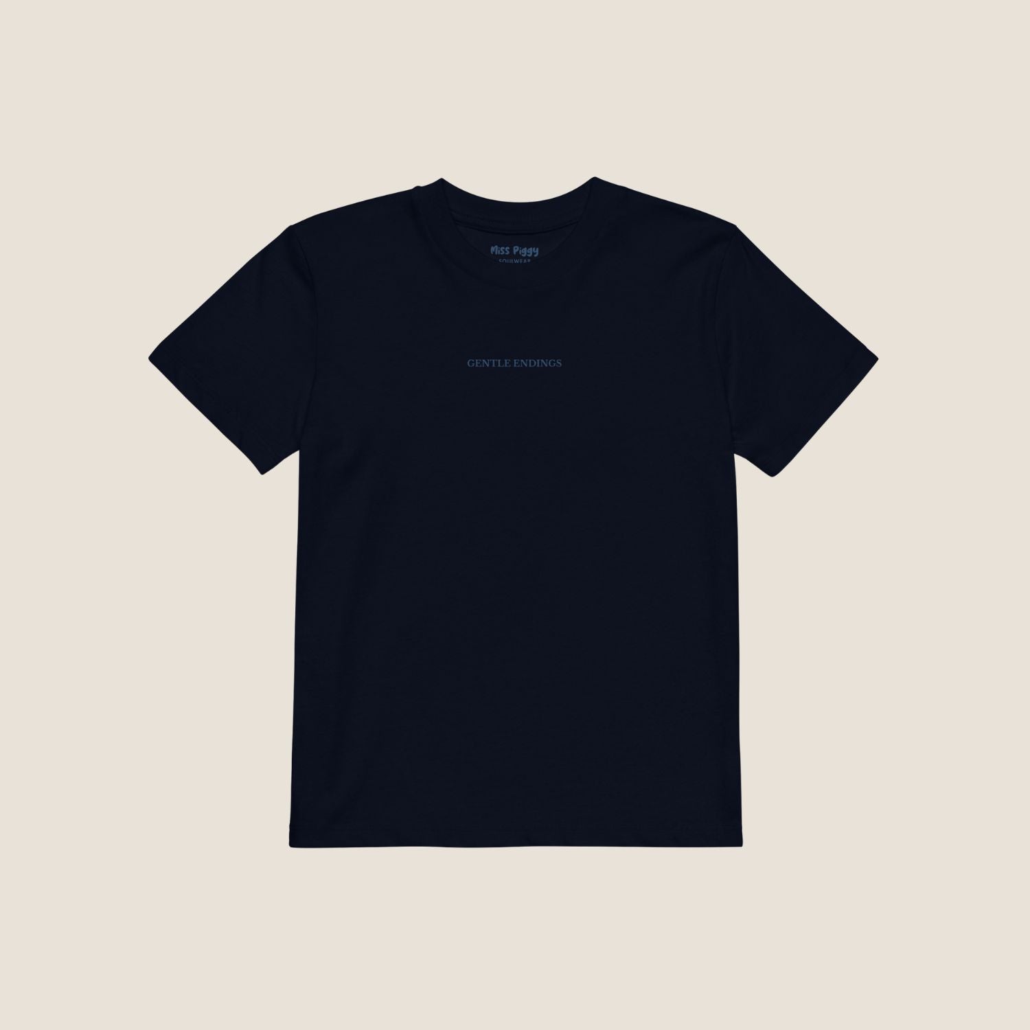 Organic kids t-shirt in navy with Gentle Endings front print and back featuring star illustration and Gentle Endings message.