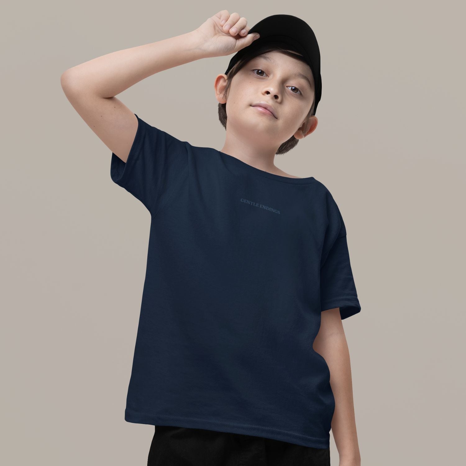 Organic kids t-shirt in navy with Gentle Endings front print and back featuring star illustration and Gentle Endings message.