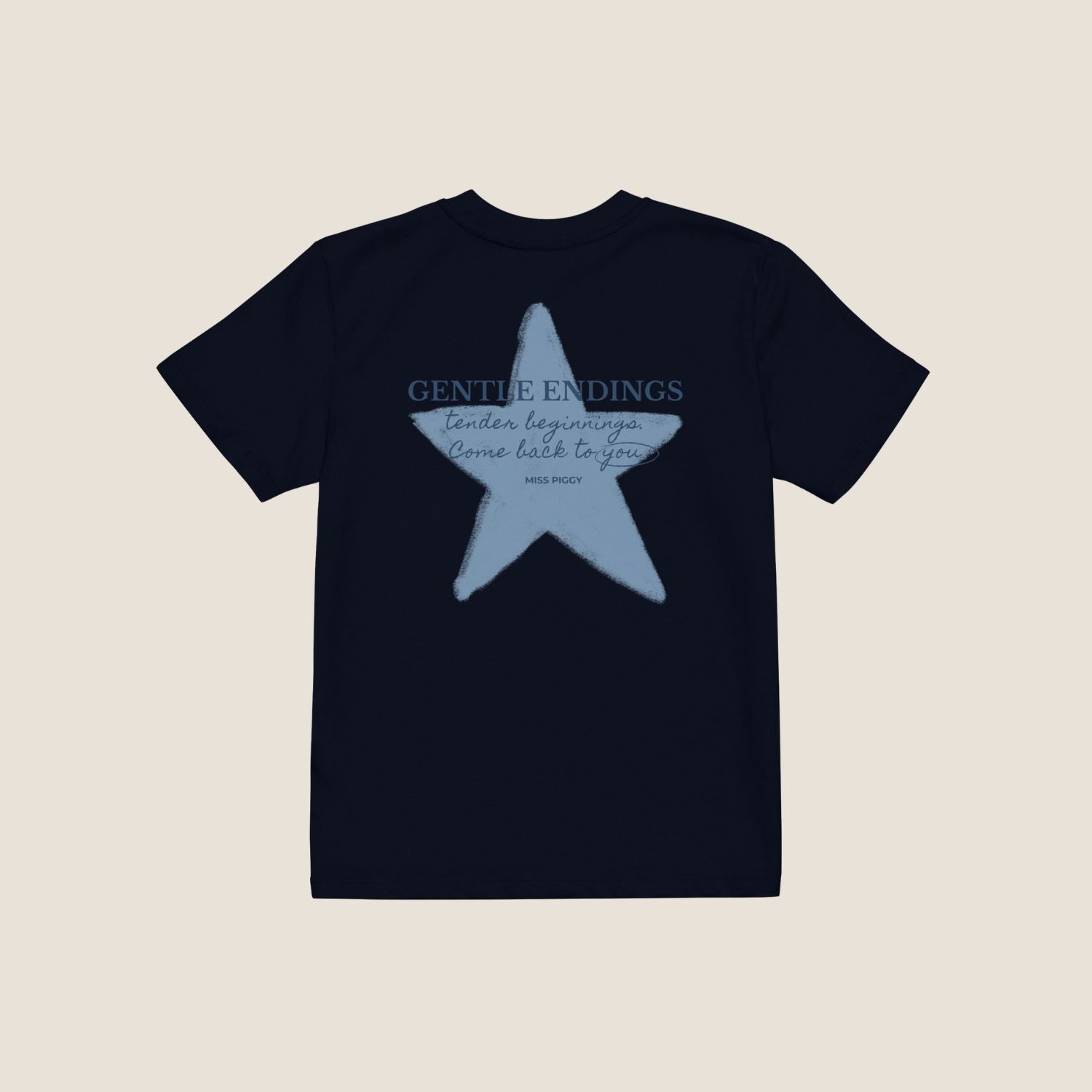 Organic kids t-shirt in navy with Gentle Endings front print and back featuring star illustration and Gentle Endings message.