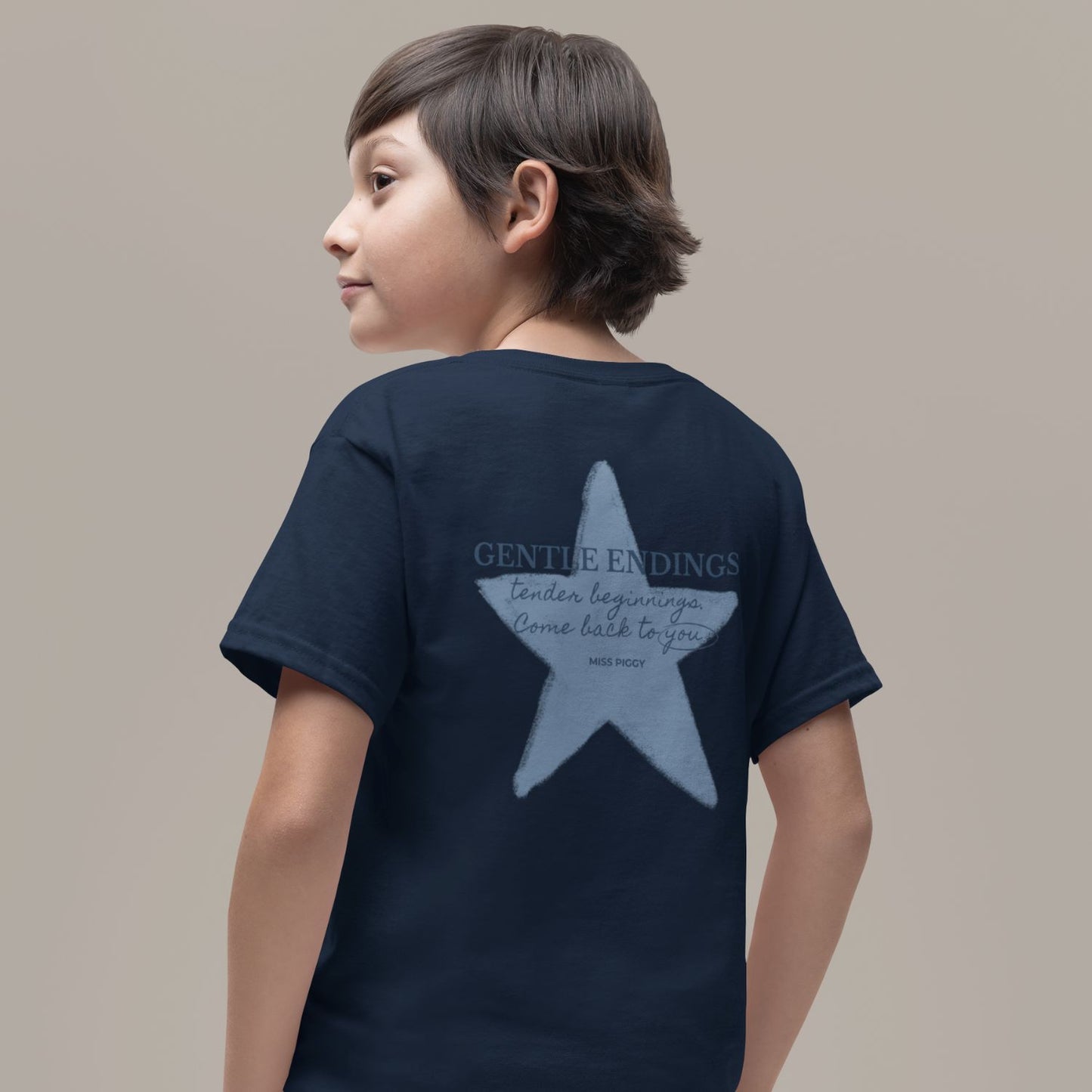 Organic kids t-shirt in navy with Gentle Endings front print and back featuring star illustration and Gentle Endings message.