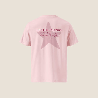 Gentle Endings Organic T-Shirt in cotton pink with small lipstick pink print in front  and featuring in back a star illustration and message.
