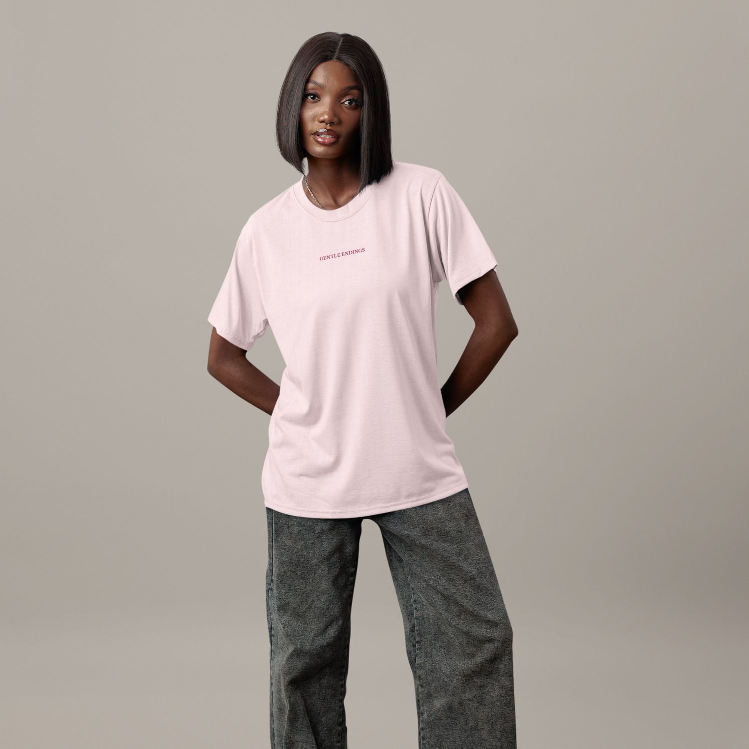 Gentle Endings Organic T-Shirt in cotton pink with small lipstick pink print in front  and featuring in back a star illustration and message.