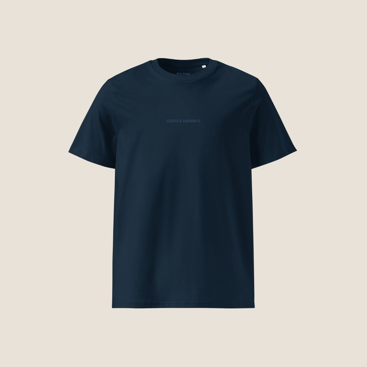 Gentle Endings Organic T-Shirt in navy with small blue print in front  and featuring in back a star illustration and message.