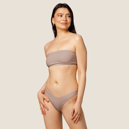 MALVA bandeau bikini top in recycled fabric - soft, minimal and made to move gently with the body. Soulwear for sun and presence.