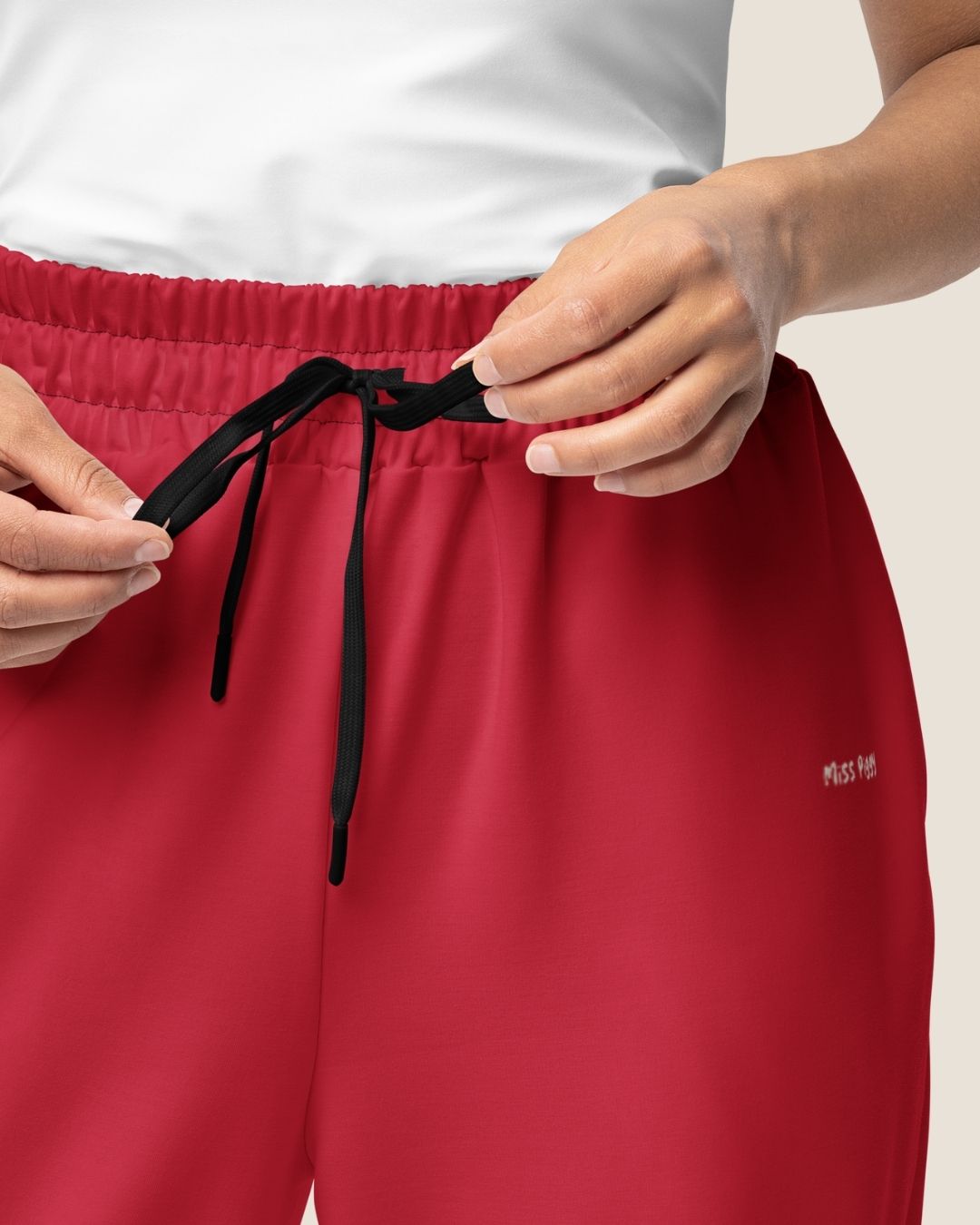 MISS PIGGY BASIC WIDE SWEATPANTS in red with off-white print, made from recycled materials.