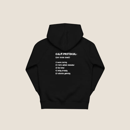Protocol Organic Kids Hoodie in black with minimal Miss Piggy print in front and back with protocol-style list design.