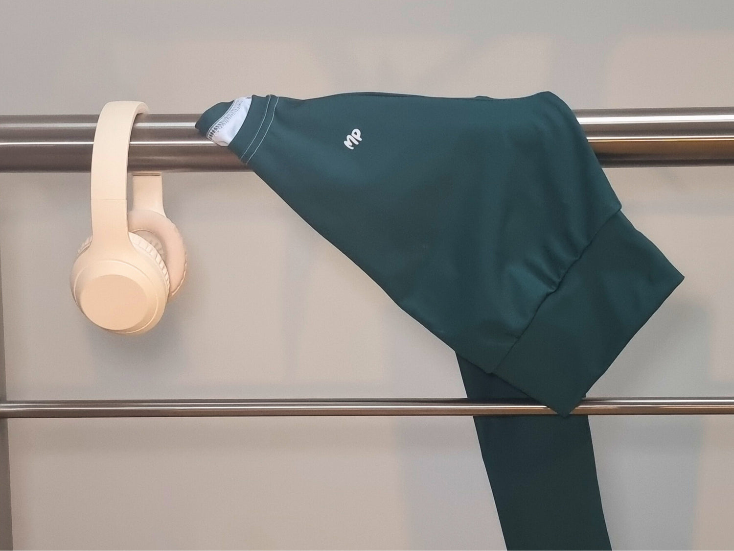 Recycled poliester fabric folded softly under natural light.