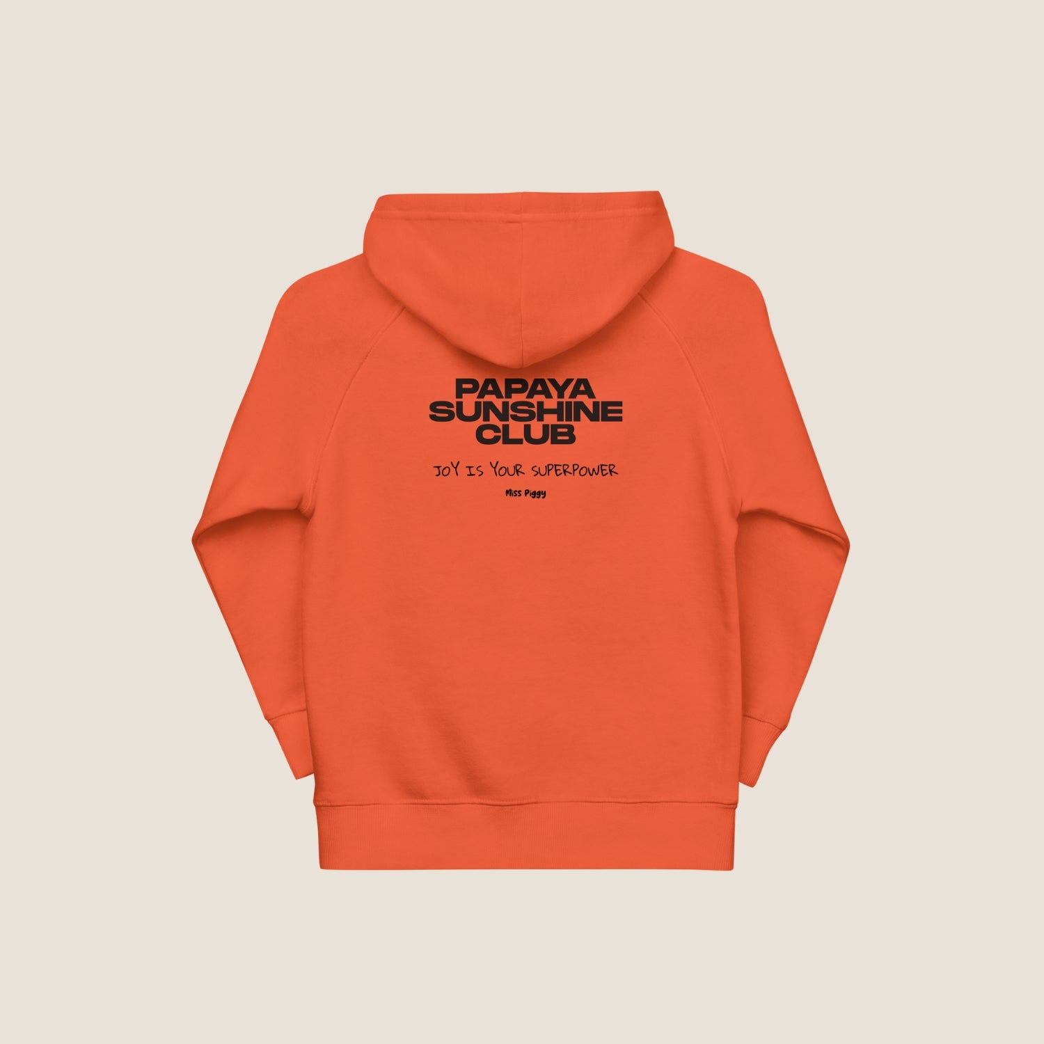 Child wearing the SUN CLUB hoodie in a relaxed fit, made from organic cotton and recycled polyester. Unisex design with soft texture and natural tone, photographed against a light, playful background.
