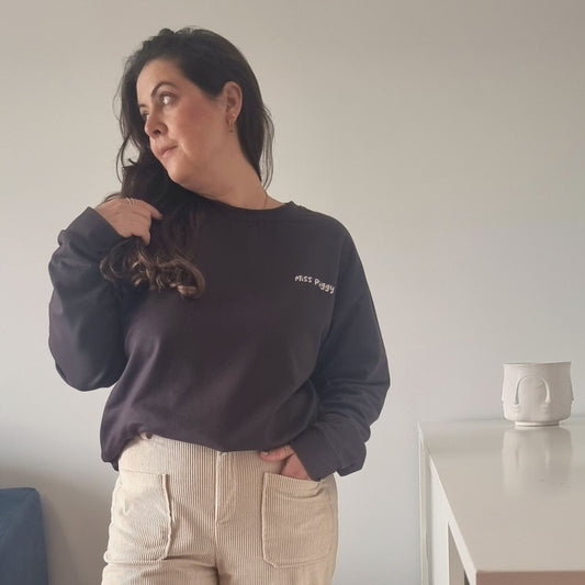 Unisex UNSEEN Recycled Sweater in espresso brown with sand print, minimalist sustainable design by Miss Piggy.