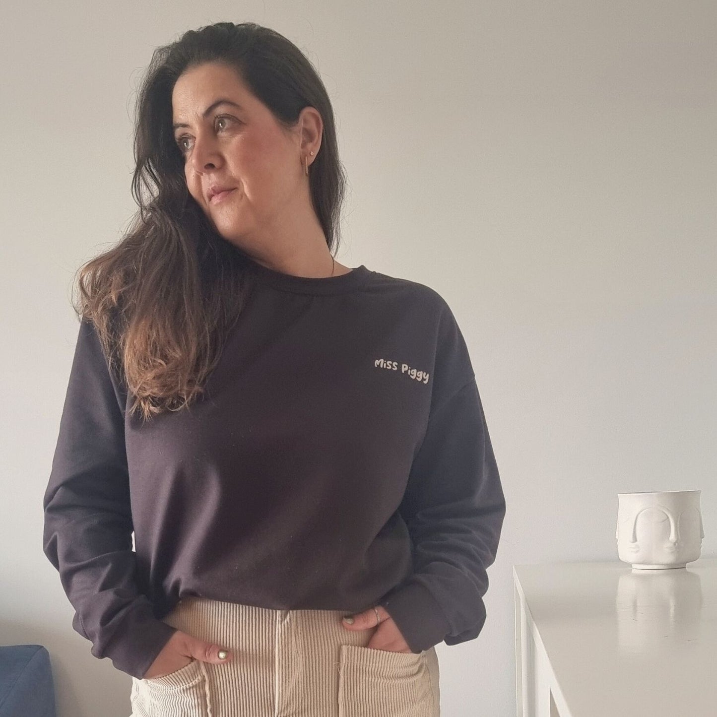 Unisex UNSEEN Recycled Sweater in espresso brown with sand print, minimalist sustainable design by Miss Piggy.