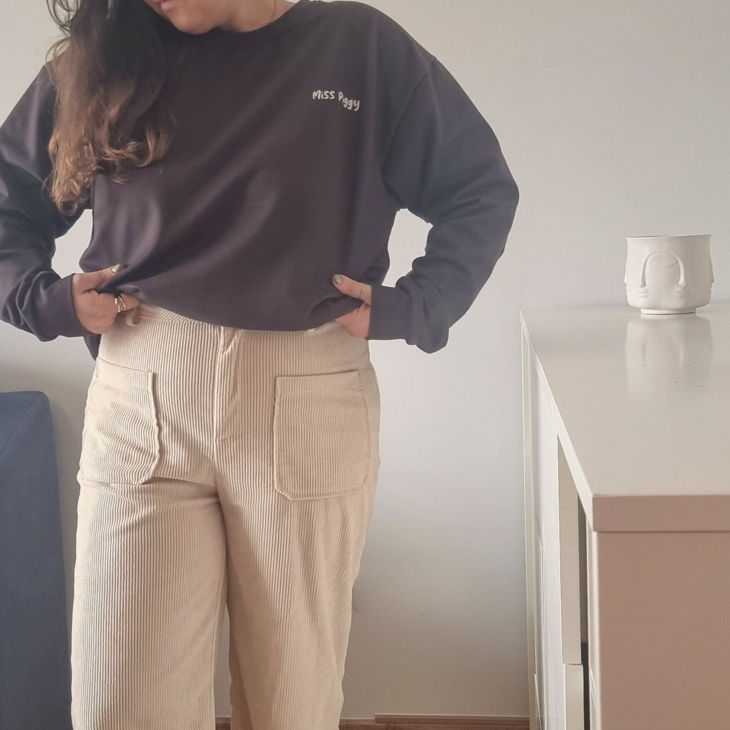 Unisex UNSEEN Recycled Sweater in espresso brown with sand print, minimalist sustainable design by Miss Piggy.